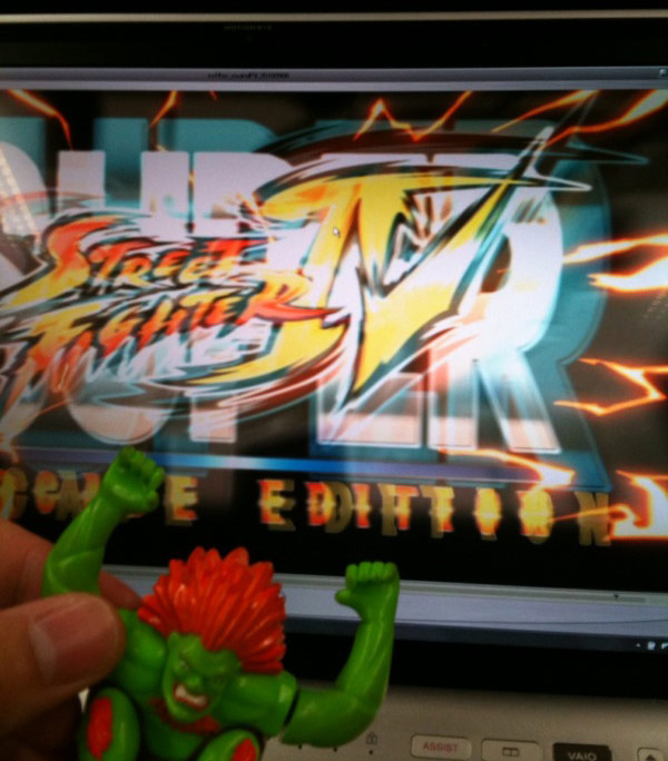 Low quality show of Super Street Fighter 4's arcade logo